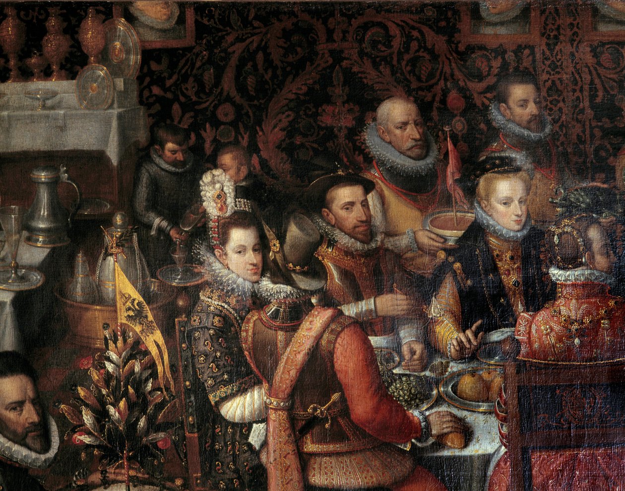 مأدبة ملوك منزل النمسا تظهر التفاصيل على اليمين آن النمسا (1549-1580) ، زوجة فيليب الثاني ملك إسبانيا (1527-1598) ، بجانبها ، وعلى اليسار الطفلة إيزابيلا كلارا يوجينيا ( 1566-1633). اللوحة بواسطة ألونسو سانش بواسطة ألونسو سانشيز كويلو