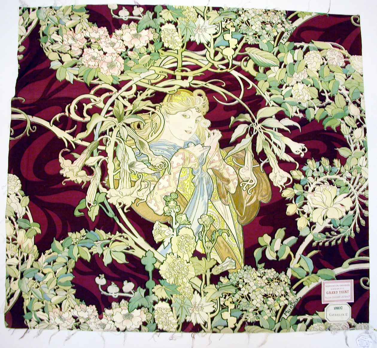 لوحة بعنوان "Femme à marguerite" (امرأة مع ديزي) بواسطة ألفونس ماري موتشا