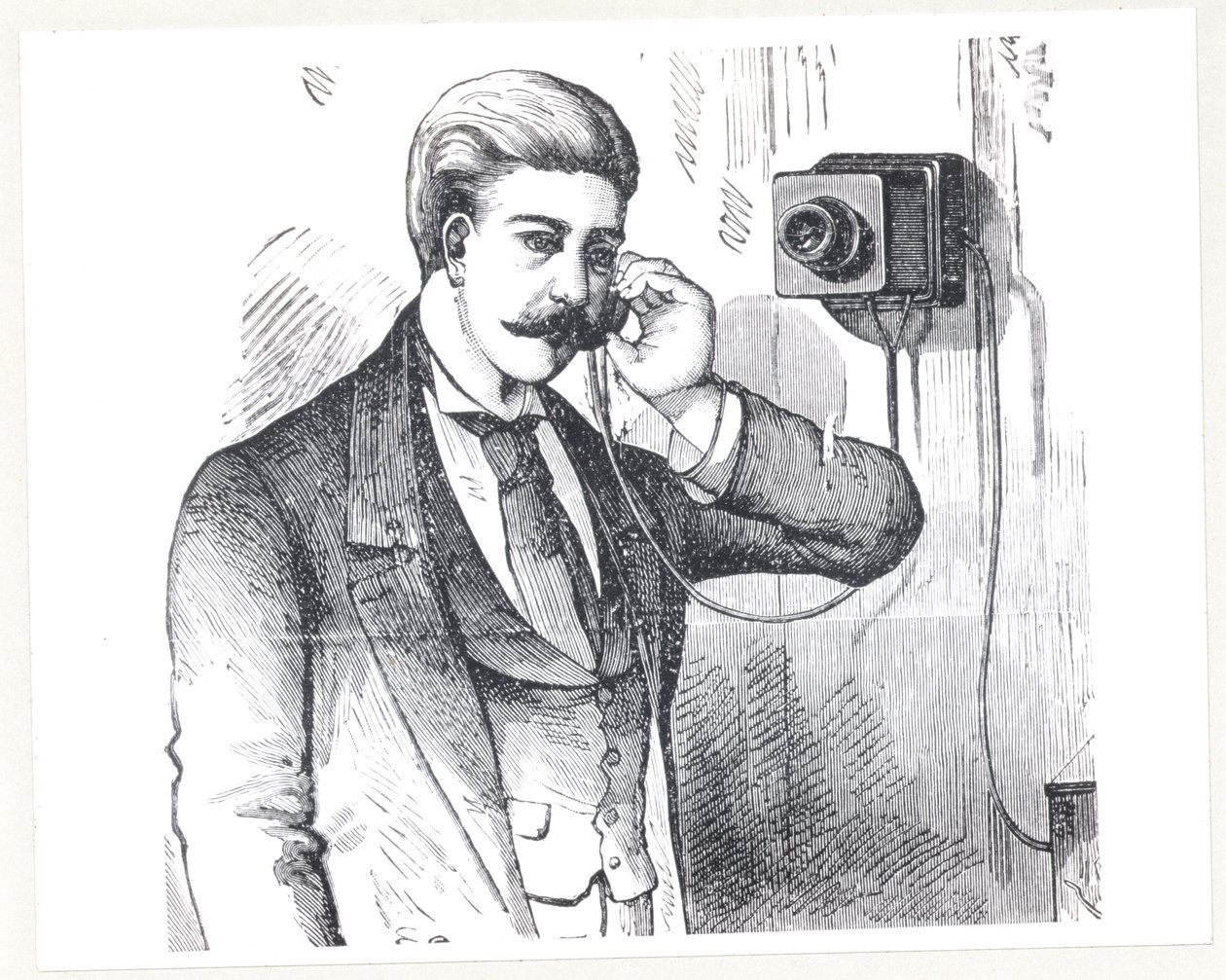 مكثف الهاتف قيد الاستخدام ، من الهاتف الكهربائي بواسطة جورج بارتليت بريسكوت (م 1830) ، 1890 بواسطة المدرسة الأمريكية