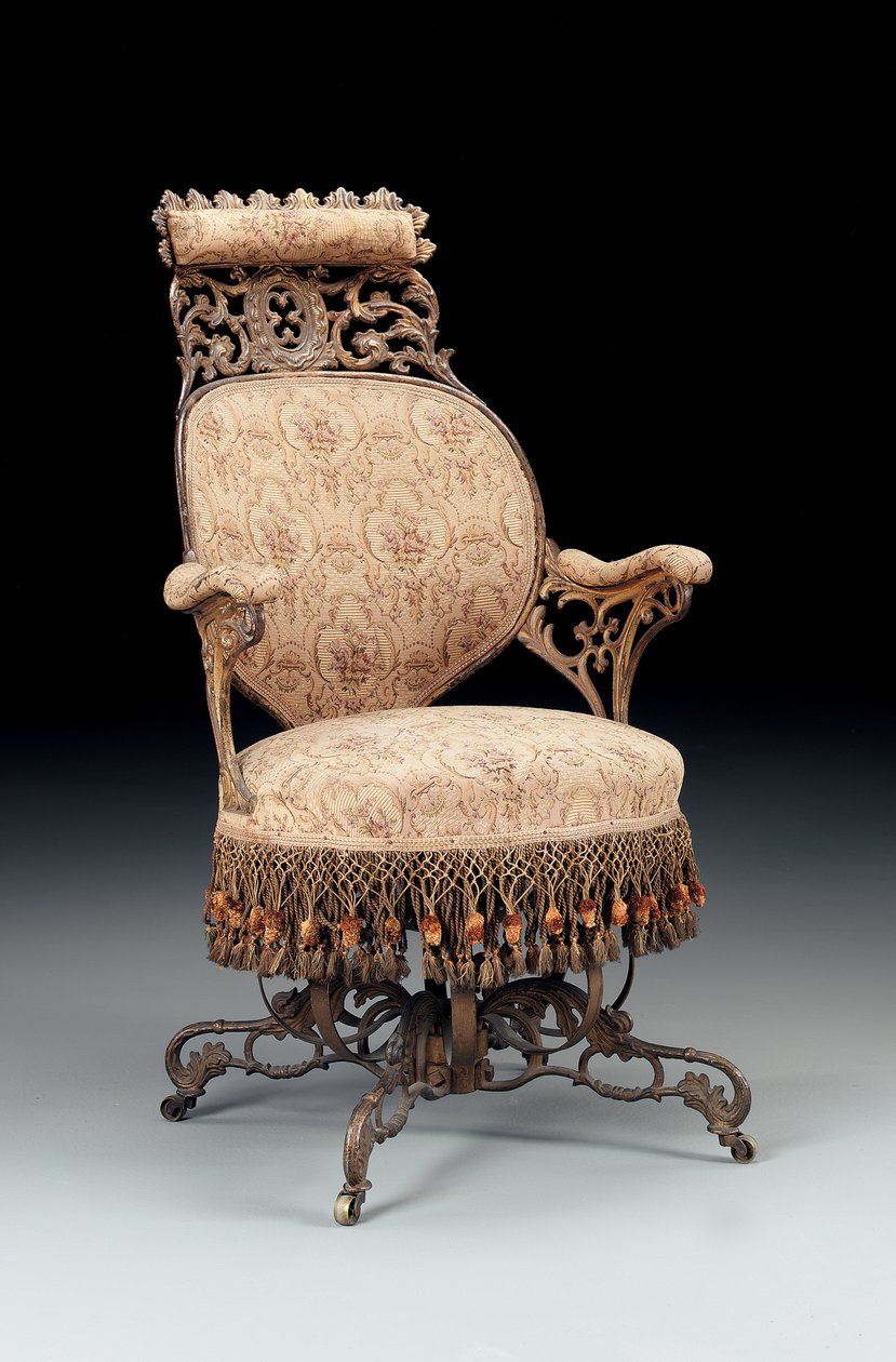 Rococo Revival كرسي بذراعين من الحديد الزهر مطلي ومذهب بالجاذبية ، تم تصنيعه بواسطة شركة American Chair ، نيويورك ، حوالي 1850 بواسطة المدرسة الأمريكية