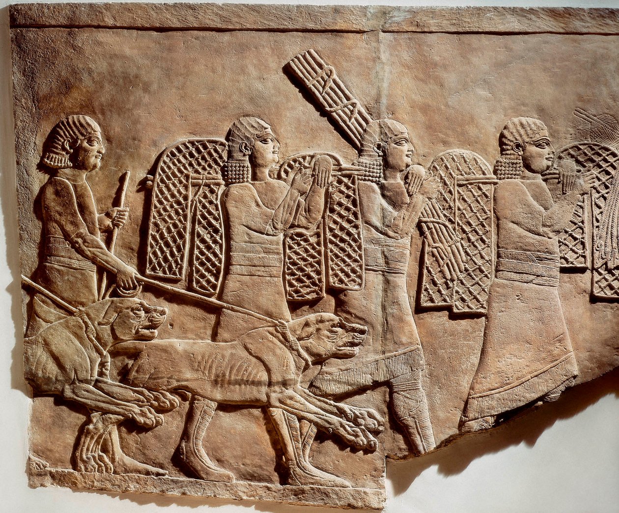 Scene of Ashurbanipal hunting, from Royal Palaces of Nineveh, c.645 BC (stone bas relief) بواسطة الآشورية