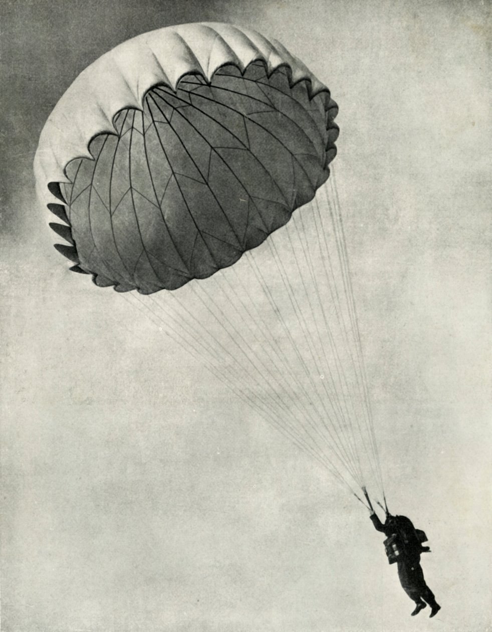 طيار يستخدم مظلة خلال الحرب العالمية الثانية ، 1941. بواسطة تشارلز براون