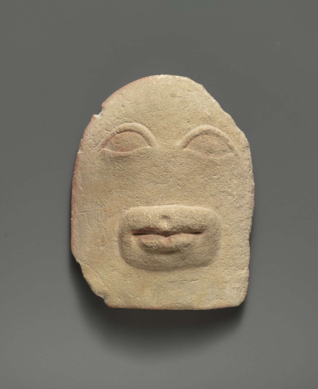 Limestone votive relief of eyes and a mouth (limestone) بواسطة المدرسة القبرصية