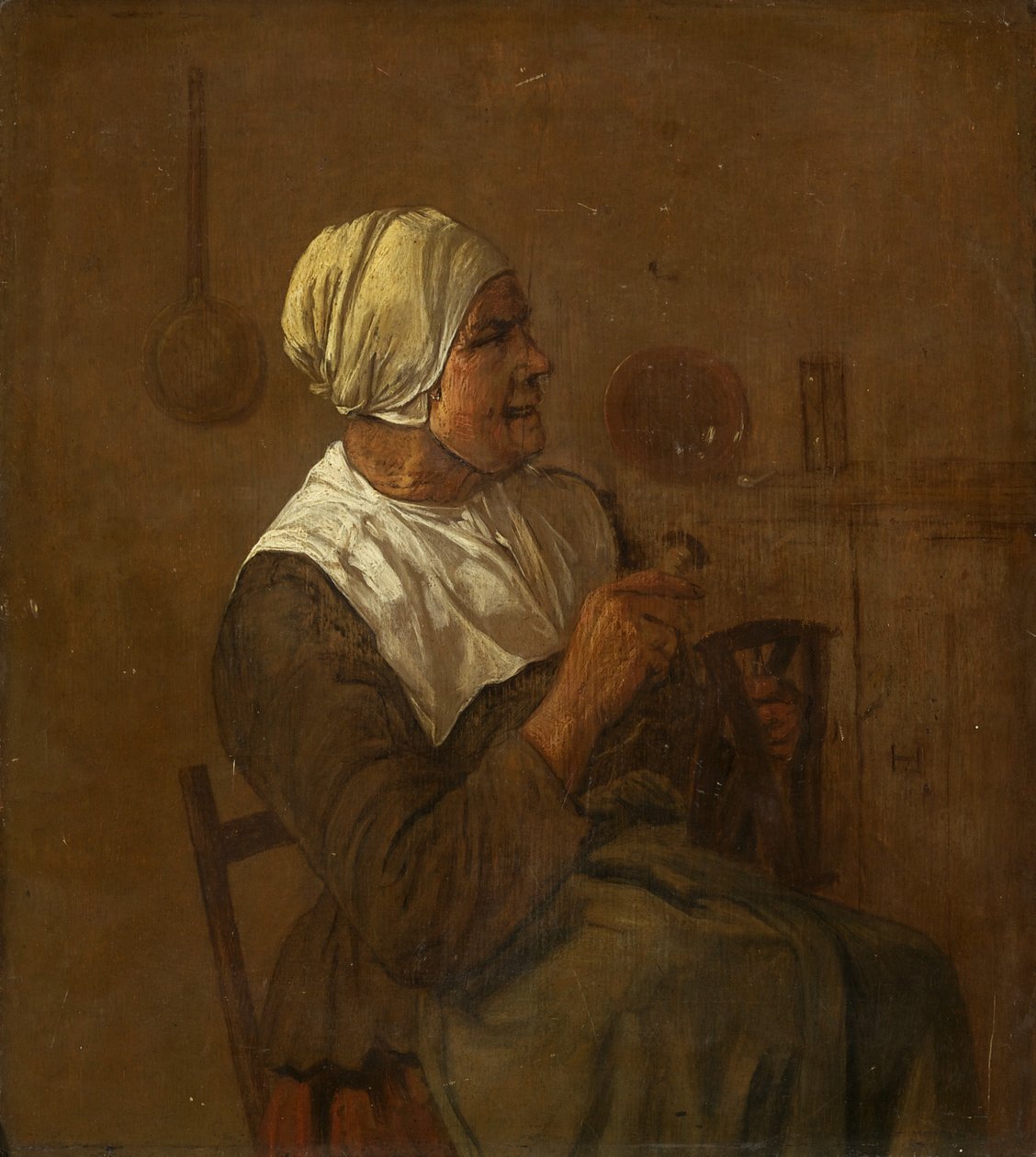 An Old Woman Seated, c.1650-1700 (oil on panel) بواسطة المدرسة الهولندية