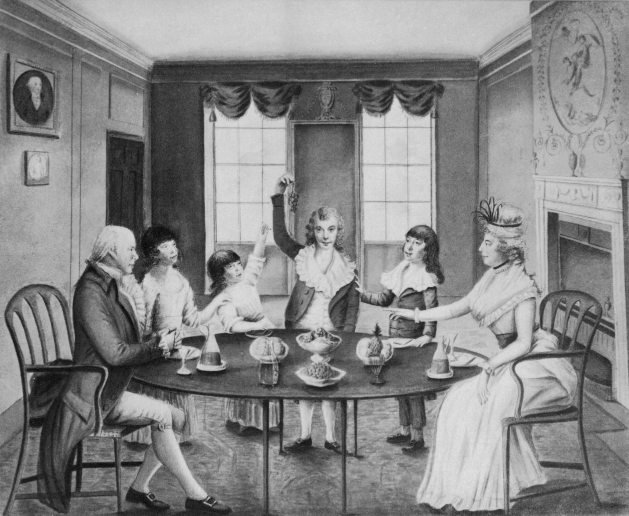 تصميم داخلي لسيدة ورجل نبيل جالسين على طاولة وأطفالهما الأربعة يقفون خلفها ، حوالي عام 1780 بواسطة مدرسة اللغة الإنجليزية