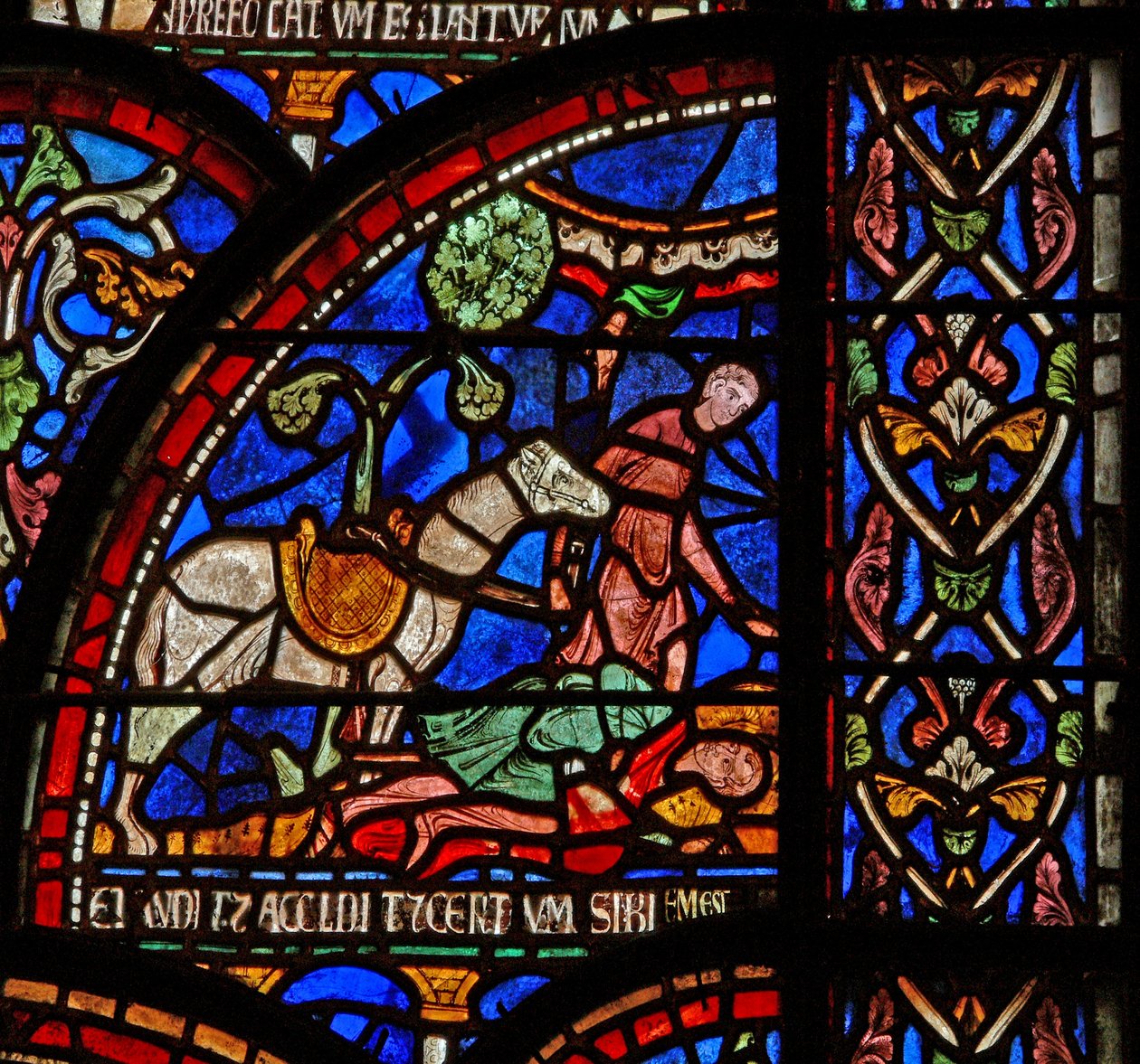 نافذة s7 تصور مشهدًا من نافذة St Thomas Becket Miracle: William of Gloucesteris مدفونًا ولكن صوته مسموع بواسطة مدرسة اللغة الإنجليزية