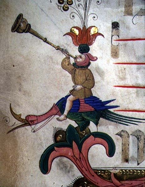Missal 515 f.9r شخصية تهب قرنًا ، مثبتة على طائر مُسخر ، تفاصيل الحدود الزخرفية من كتاب جوقة أُعدم قبل عام 1449 (تفاصيل 88907) بواسطة Filippo di Matteo Torelli