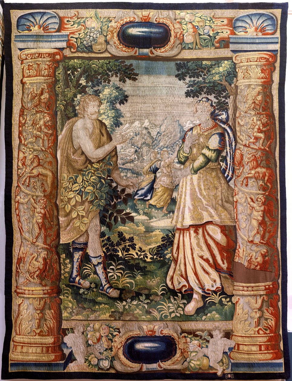 نسيج فلمنكي. مسلسل جالانتري (جالانت). مشهد غالانت (Escena galante). صنع بروكسل ، أوائل القرن السابع عشر. نسيج حرير وصوف ، 5/6 الاعوجاج لكل سم. مقاس ٣٤٨ × ٢٦٣ سم. الموقع كنيسة سان ميلان دي لا كوجولا ، أونكالا (سوريا). أصل تبرع بواسطة المدرسة الفلمنكية