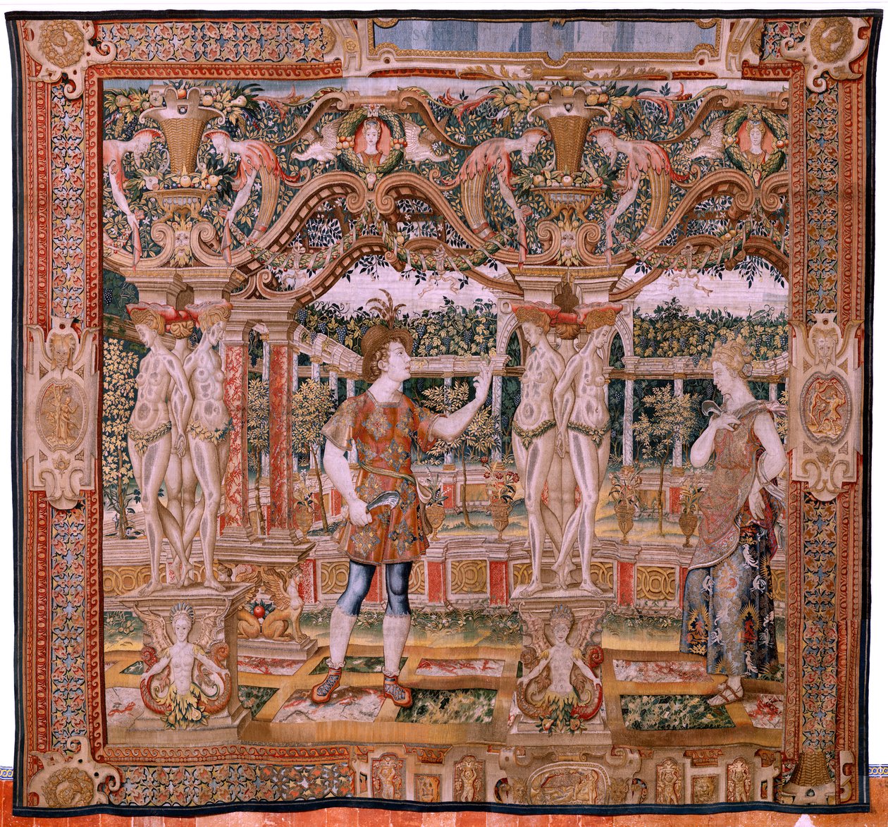 نسيج فلمنكي. سلسلة Vertumnus و Pomona. No IV Vertumnus تحول إلى مقلّم (Vertumno y Pomona IV (Vertumno transformado en podador). نماذج دائرة بيتر كويك فان إيلست وليونارد تيري. أتيليه غير معروف ، بروكسل. الذهب والحرير والصوف. ب بواسطة المدرسة الفلمنكية