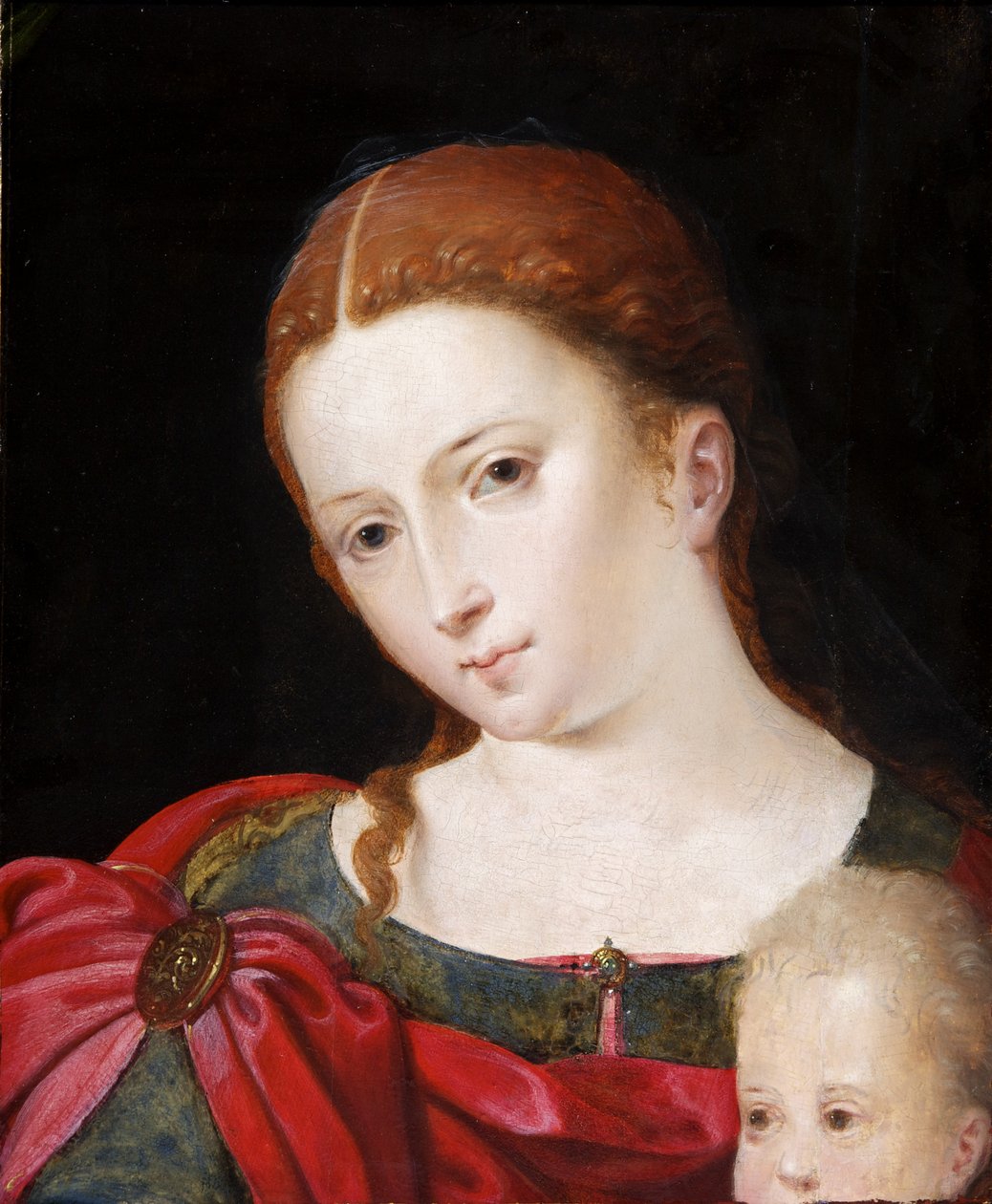 Head and shoulders of a girl in red cloak over blue dress, c.1550 (oil on panel, oak) بواسطة المدرسة الفلمنكية
