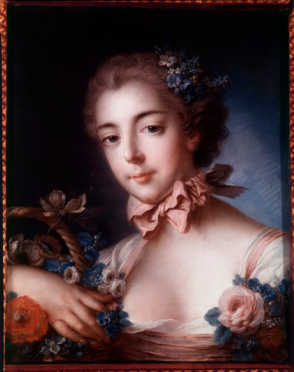 Portrait of a young woman leaning on a basket of flowers. Pastel painting by Francois Boucher (1703-1770) بواسطة فرانسوا باوتشر