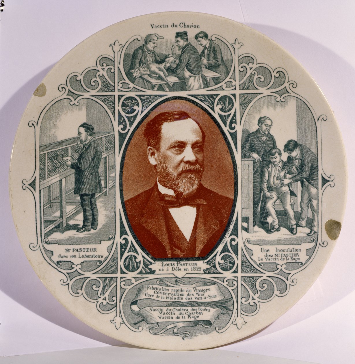لوحة بها صورة لويس باستور (1822-1895) بواسطة بيير بيتيت (1832-1909) ، ومشاهد من حياته (خزفي) بواسطة المدرسة الفرنسية