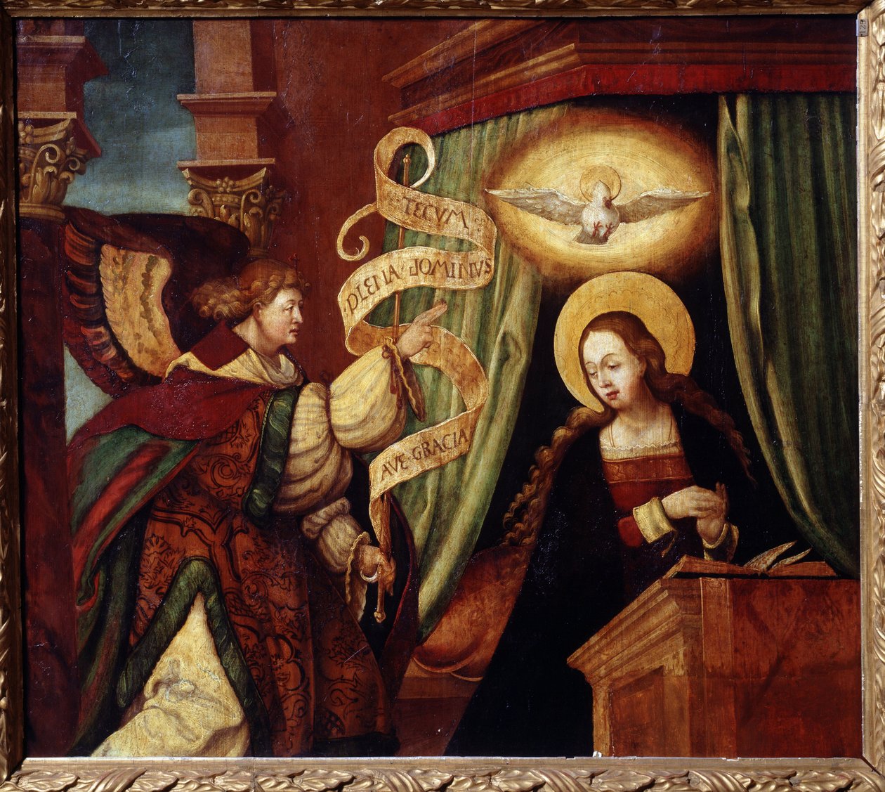 البشارة. يحمل رئيس الملائكة جبرائيل رسالة باللاتينية: "Ave gratia plena Dominus tecum" (تحية ، يا ممتلئة نعمة ، الرب معك) (بداية افي ماريا). لوحة لسيد ألماني (القرن السادس عشر). زيت بواسطة المدرسة الألمانية