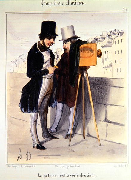 رسم كاريكاتوري يسخر من طول الوقت اللازم لالتقاط صورة من نوع daguerrotype حوالي عام 1840 (لون ليثو) بواسطة الشرف دومييه