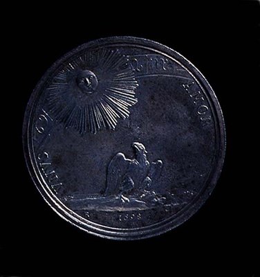 عكس ميدالية بورتريه لآنا إيزابيلا من مانتوا تصور نسرًا يراقب الشمس ، تم سكه عام 1698. نقش: VNVS AMOR (فضي) (للاطلاع على الوجه ، انظر 119199) بواسطة المدرسة الايطالية