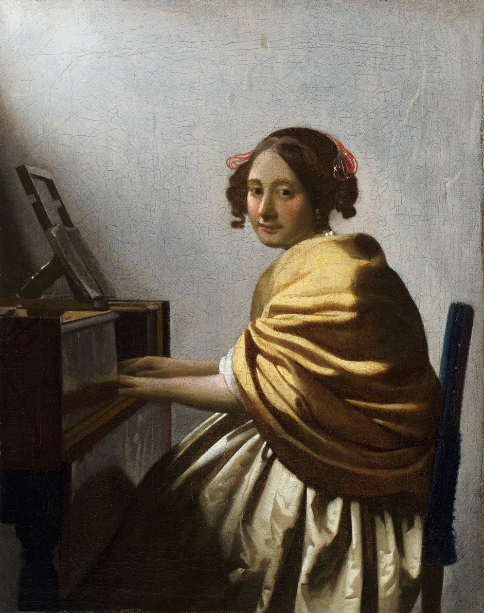 "" امرأة شابة جالسة في عذراء "(امرأة شابة جالسة في عذراء) لوحة رسمها جان فيرمير (يوهانس) (1632-1675) حوالي 1670 خافت 25.1 × 20 سم مجموعة خاصة بواسطة جون فيرمير