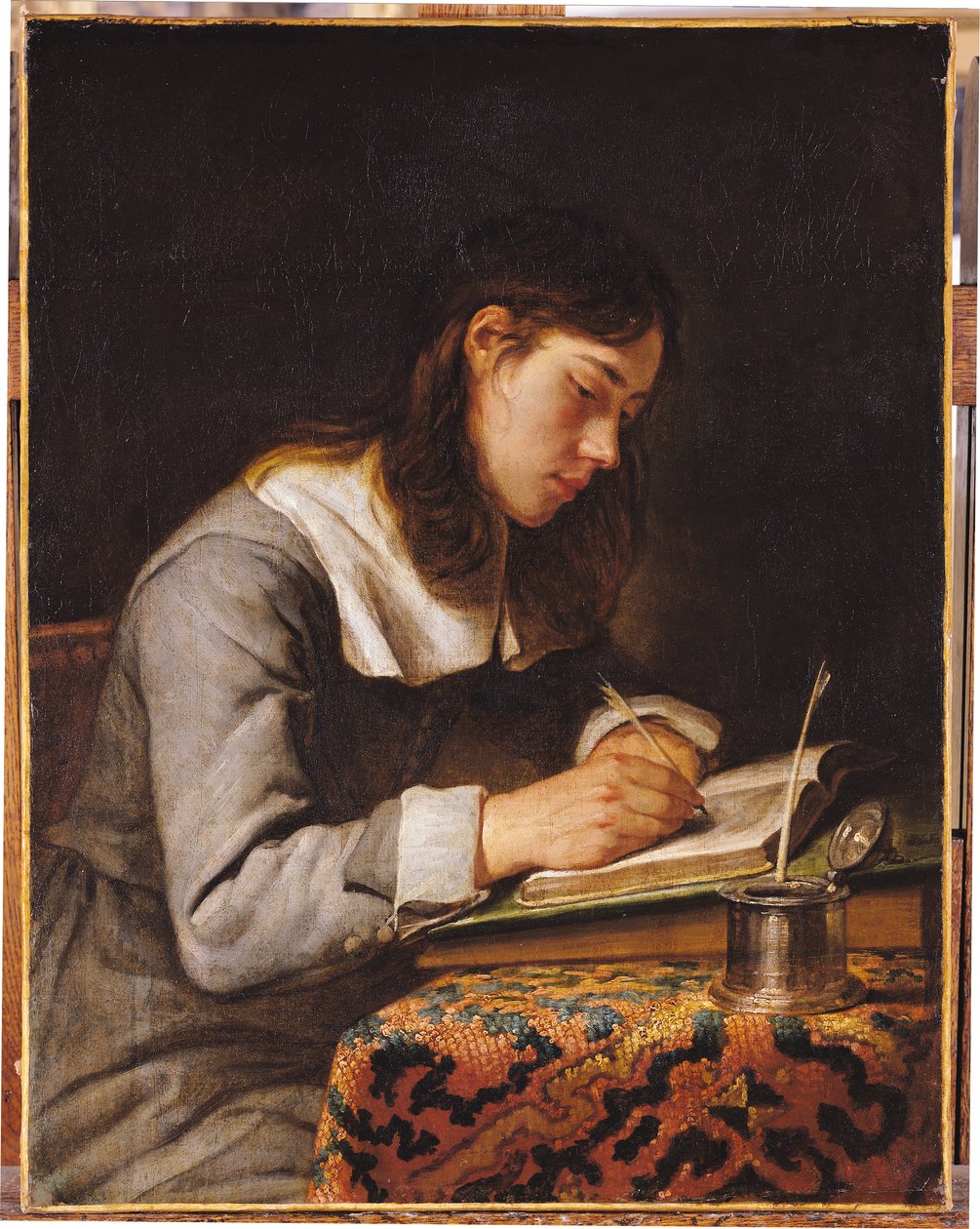 شاب يكتب بواسطة Joos van Craesbeeck