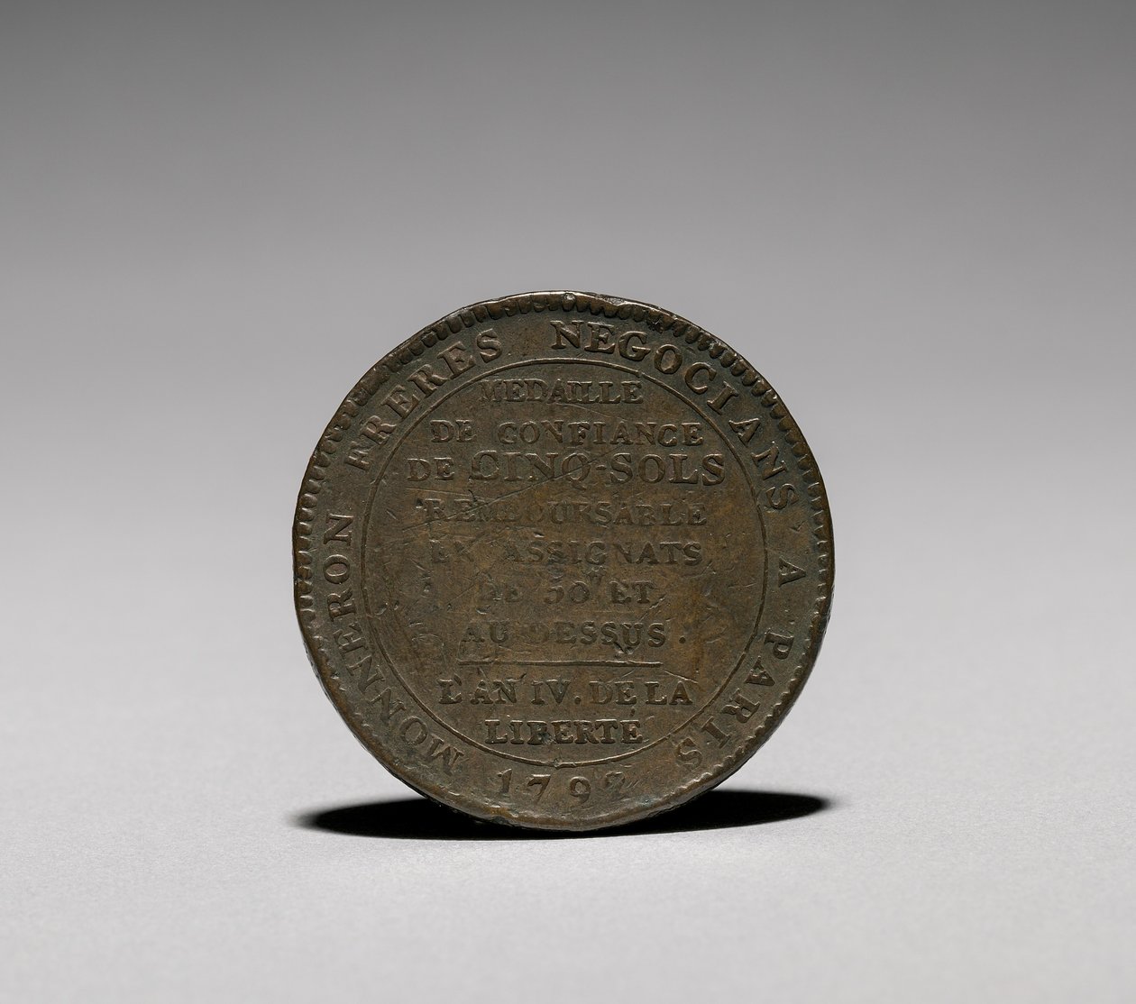 - الميدالية: خمسة مريخيات صادرة عن Monneron Brothers ، باريس 1792 معكوسة. بواسطة جول دوبري
