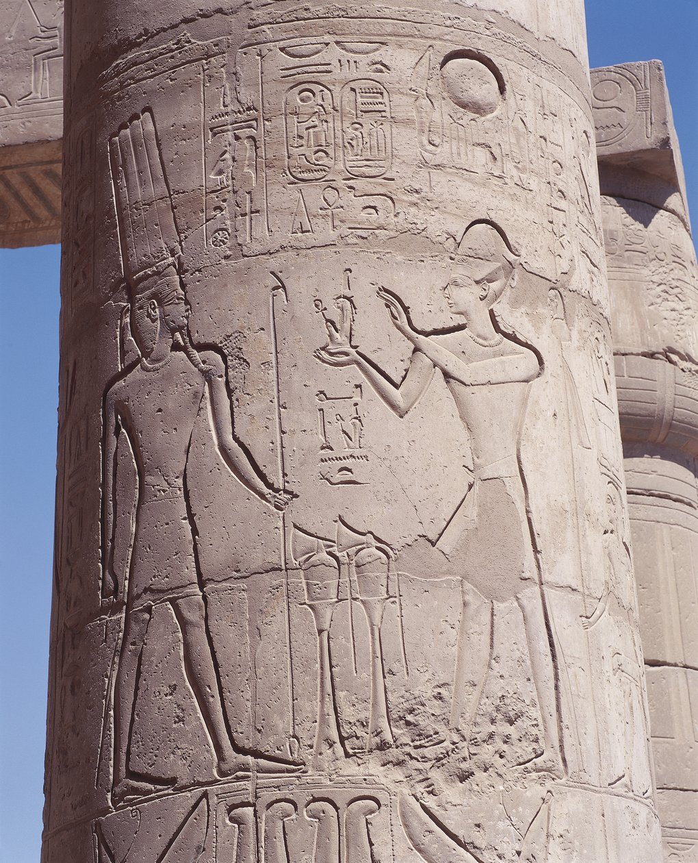 Relief of pharaoh holding goddess of justice Maat before Amon on pillar بواسطة غير معروف غير معروف