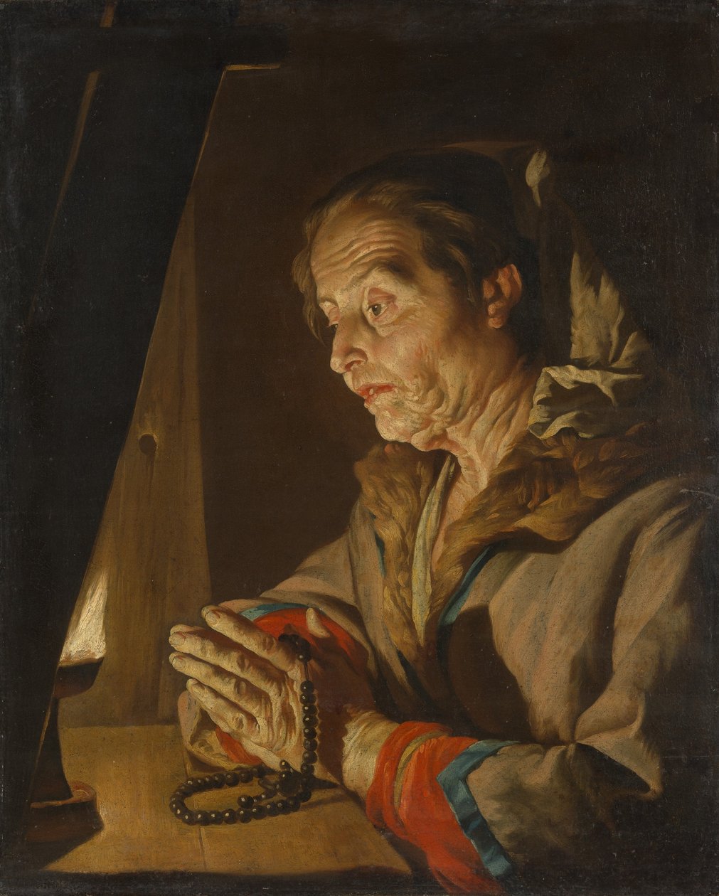 صلاة المرأة العجوز ، أواخر 1630s أو أوائل 1640s. بواسطة ماتياس ستومر