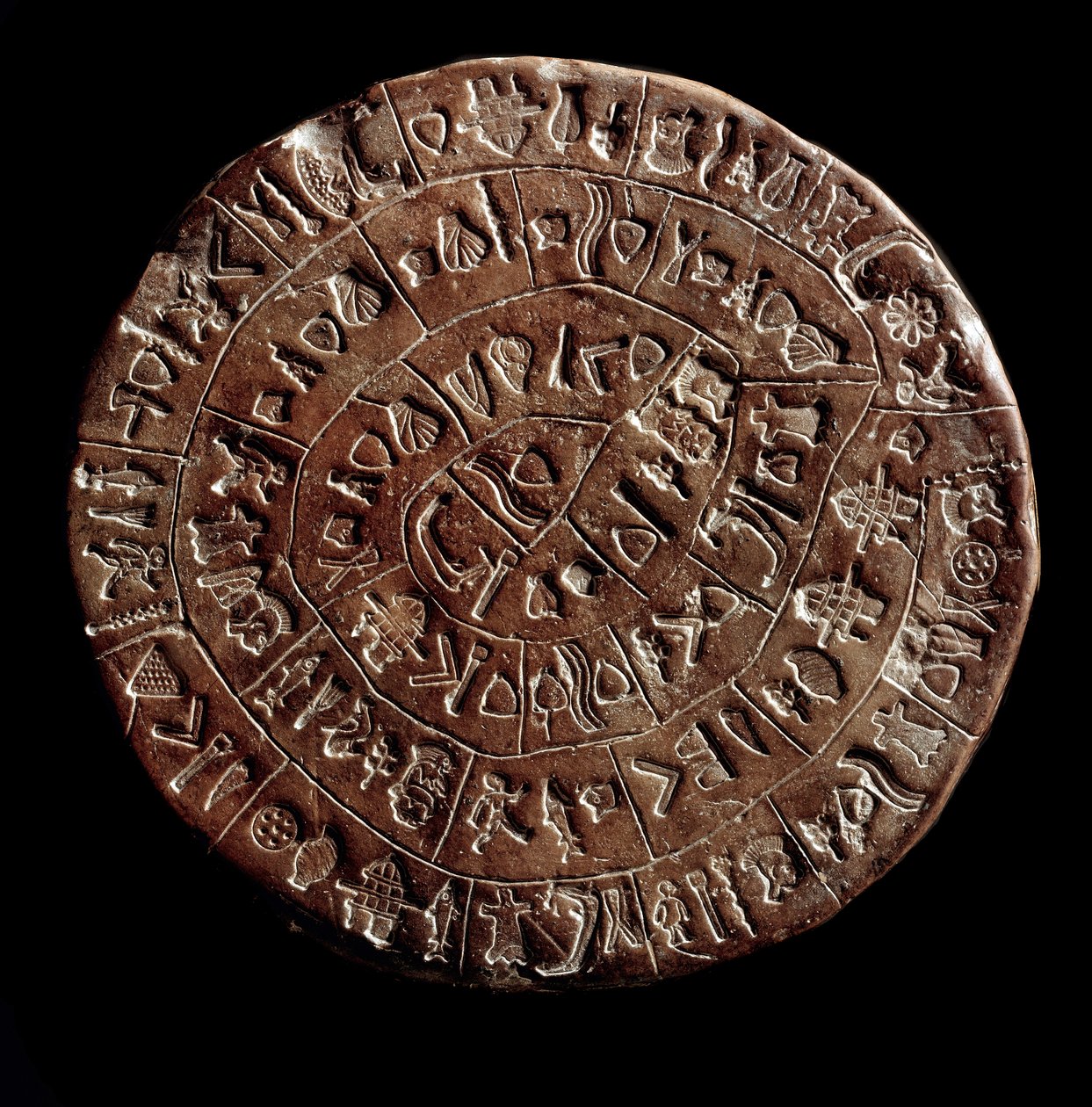 قرص Phaistos (Phaistos Disk ، Phaestos Disc) (Minoan Art - 1700 - 1600 قبل الميلاد) مغطى بالهيروغليفية. بواسطة مينوان