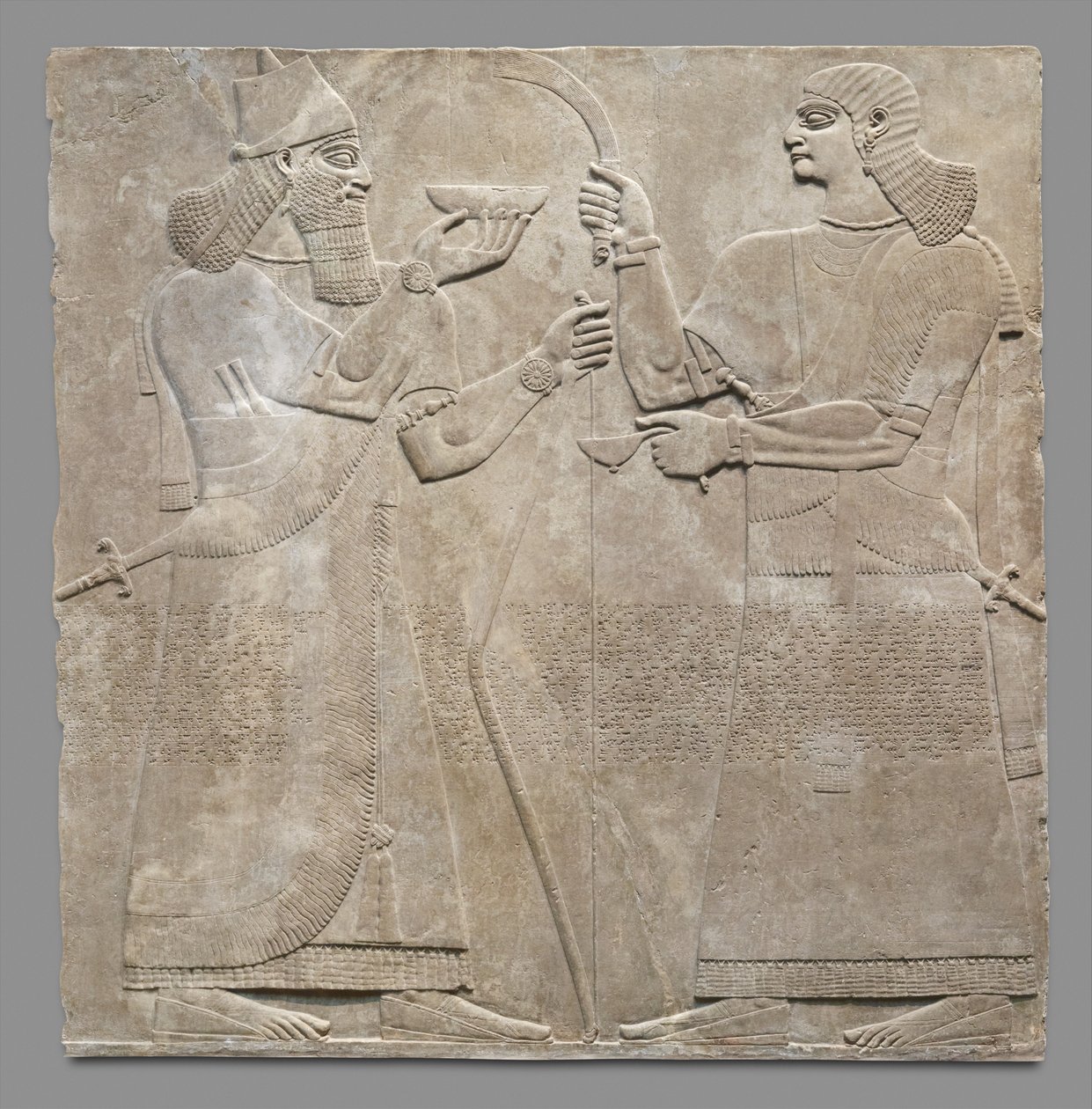 لوحة الإغاثة للملك والخصي ، c.883-59 قبل الميلاد (الجبس المرمر) بواسطة الجدد الأشوريون