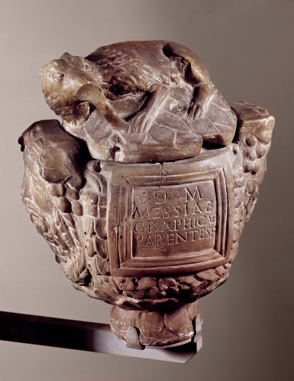Cinerary urn Messiae graphicae. From Avranches. Saint Germain en Laye, Museum of National Archaeology بواسطة باليو كريستيان