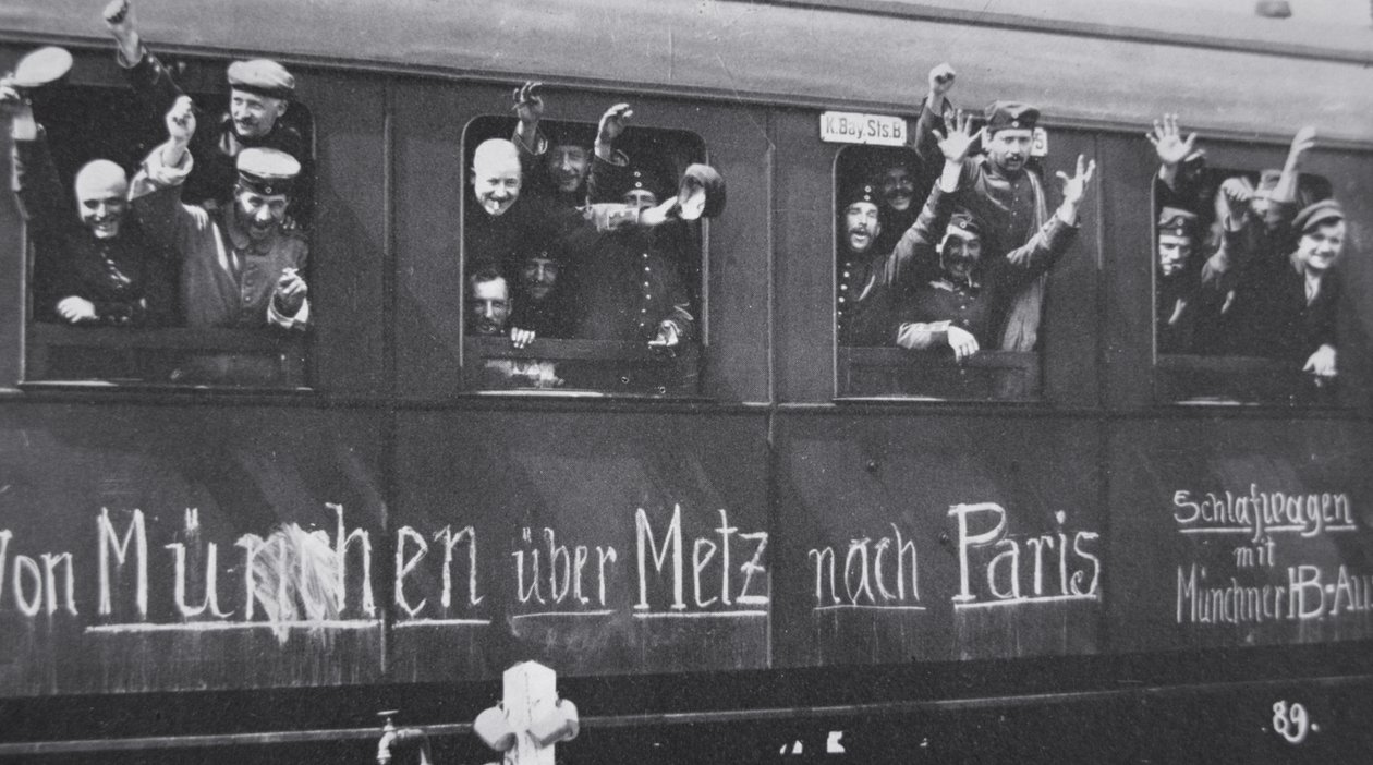 WWI German troops leave for the front in a railway carriage with the message 