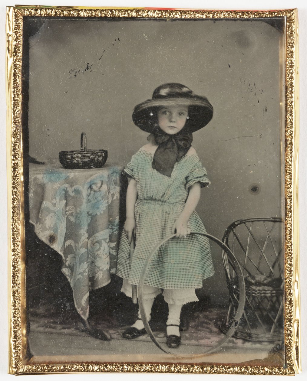 Portrait of a girl holding a hoop by a table, c 1840-1890 بواسطة ريتشارد (بعد) داد