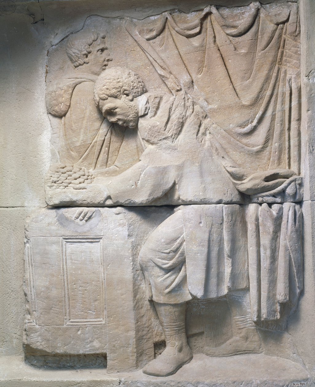 Roman Relief from mausoleum depicting bread merchant, 2nd century AD بواسطة رواية