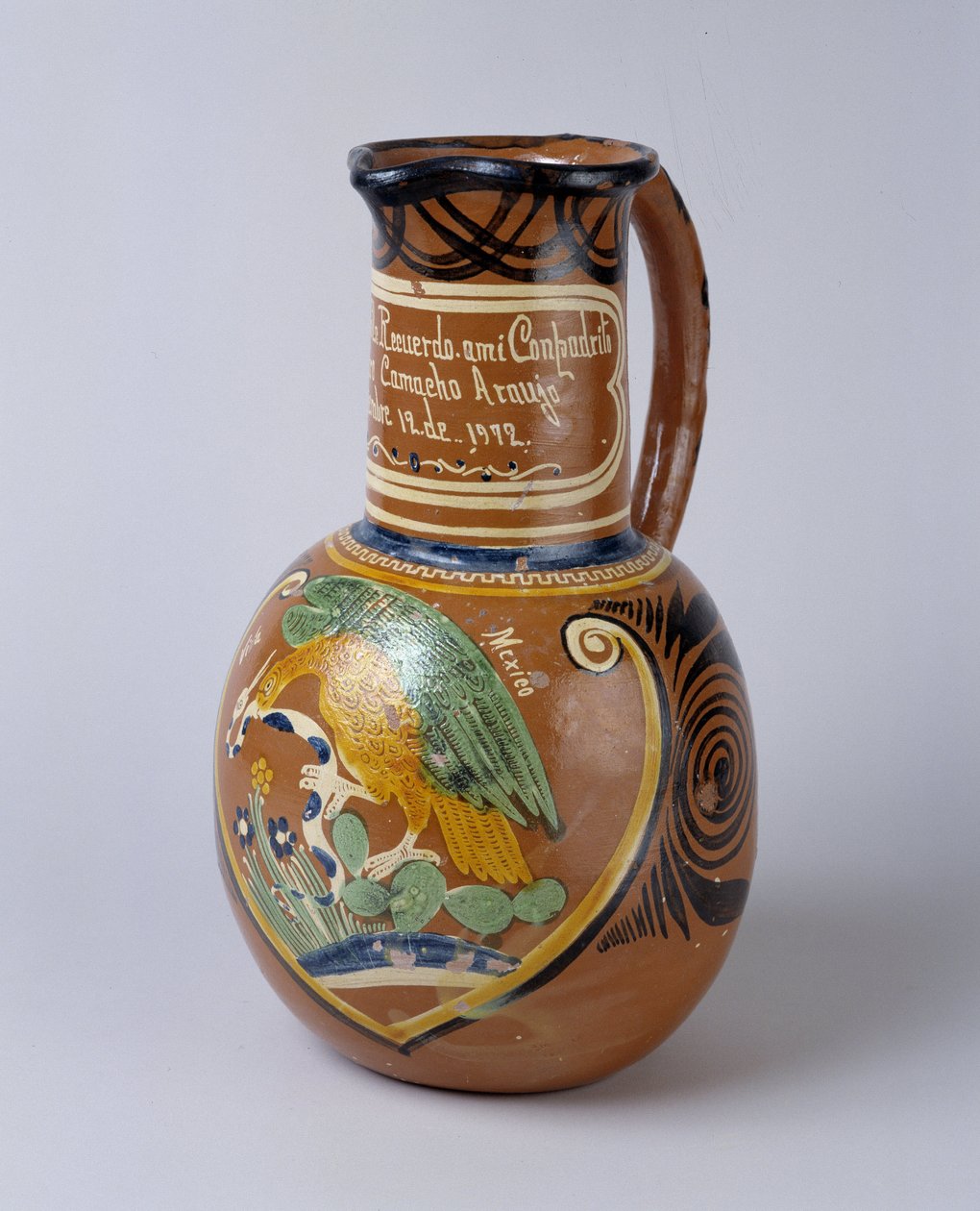 الفن الشعبي: بولك جرة (كحول الصبار المخمر) في الطين الملون والمطلي ، من المكسيك. 1972 Musee de la Vallee، Barcelonnette (Alpes de Haute Provence) بواسطة المدرسة المكسيكية