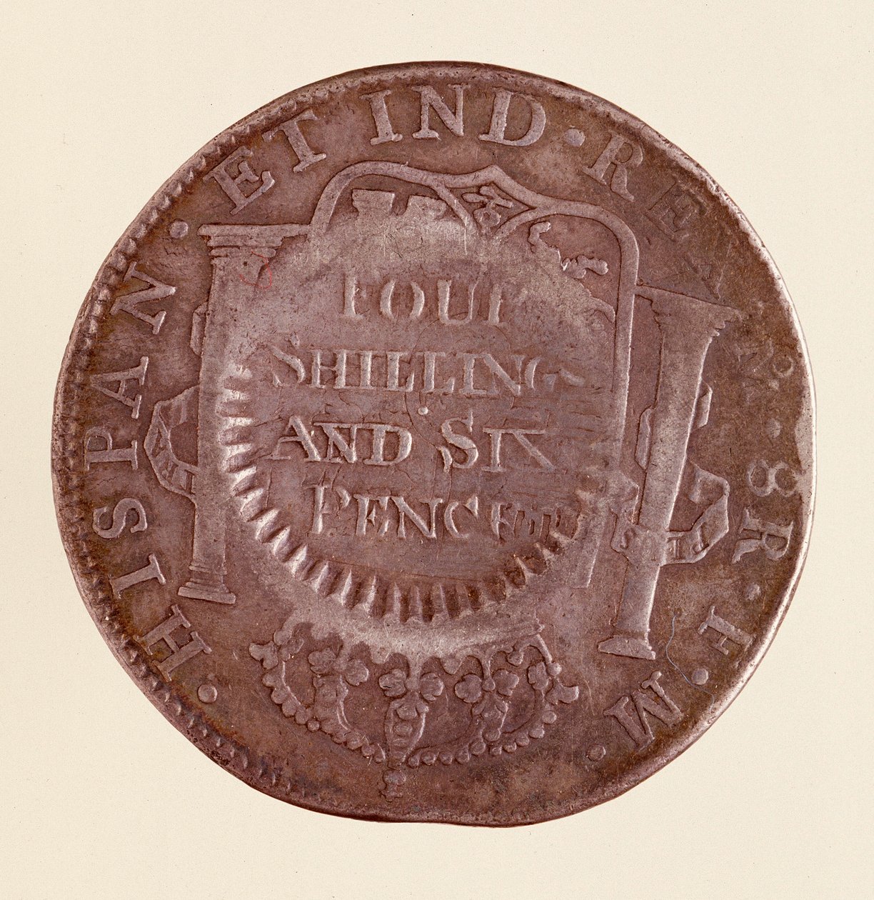 عملة فضية (8 ريالات) من إسبانيا: عهد تشارلز الثالث (1759-1788). 1777 مع عداد 1787. ديم. 3.9 سم نابولي ، المتحف الأثري بواسطة المدرسة الاسبانية
