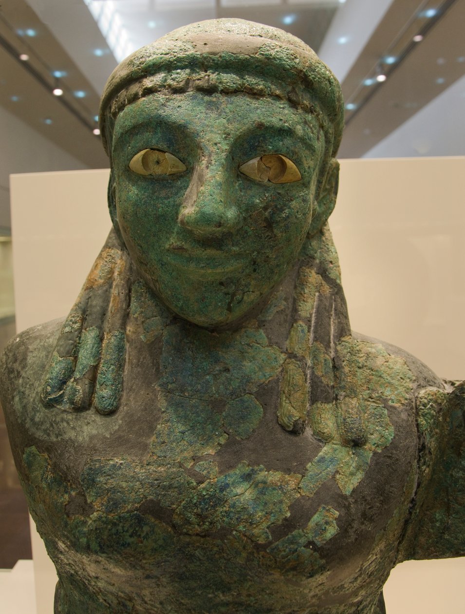 Bronze female winged figure (590 BC - 580 BC), Olympia Museum, Olympia (???????), Peloponnese, Greece (photo) بواسطة غير معروف