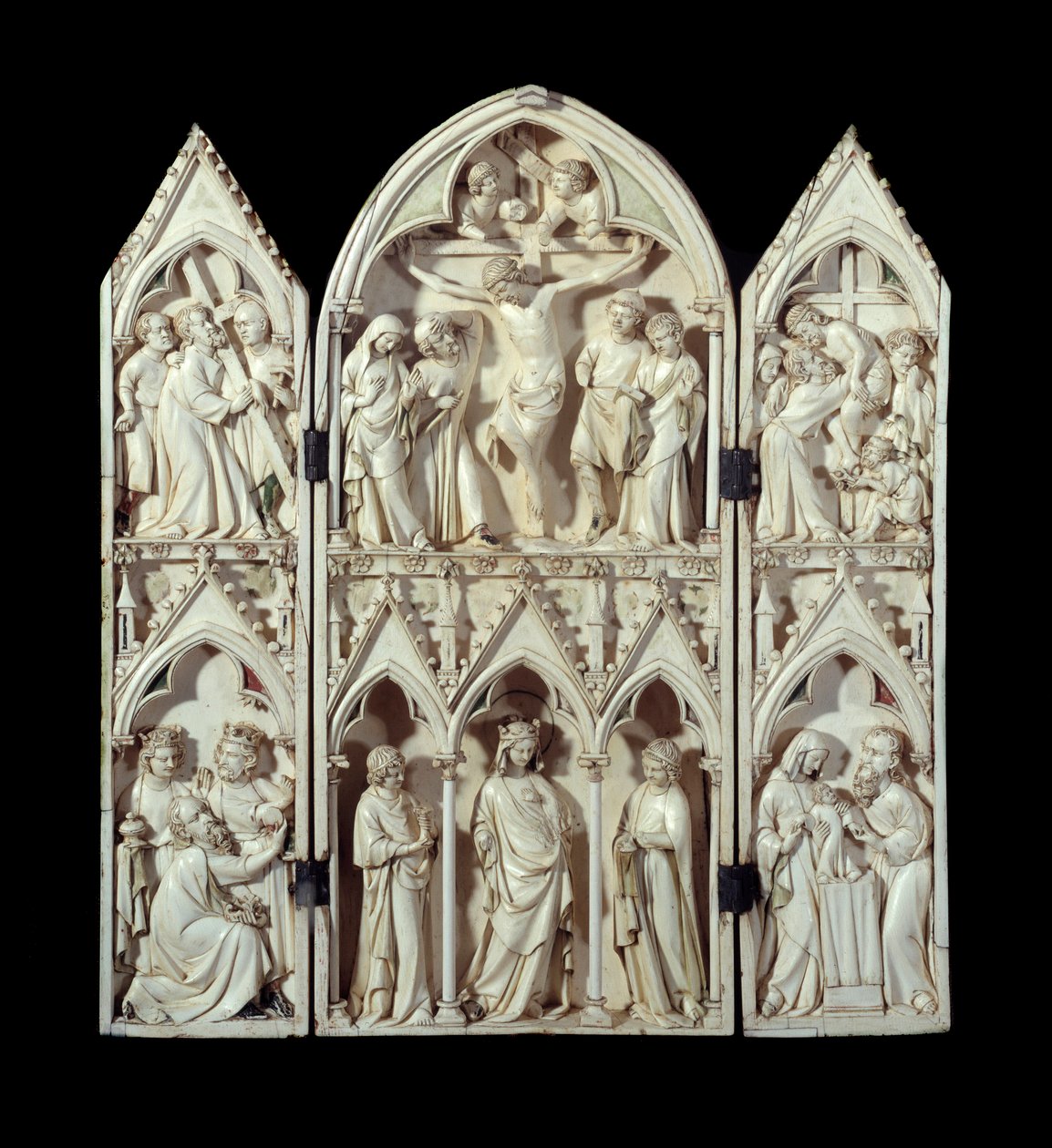 Triptych of Saint-Sulpice du Tarn: Carriage of the Cross, Crucifixion, Descent of the Cross, Adoration of the Magi, Glorious Virgin, Presentation at the Temple. Carved ivory relief stockings. Around 1300 Paris, National Museum of the Middle Ages, Thermes d بواسطة فنان غير معروف