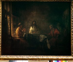 يظهر حجاج عمواس المسيح للحجاج جالسين على طاولة في نزل في عماوس. رسم ورشة عمل هارمنز فان راين ديت رامبرانت (1606-1669)