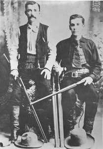 Wells Fargo stagecoach messengers armed with shotguns and Winchester repeating rifles (b/w photo) بواسطة مصور أمريكي