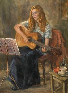 نيكولا تعزف على الغيتار