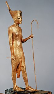 تمثال صغير للملك يرتدي التاج الأحمر للشمال ، من قبر توت عنخ آمون (1370-52 قبل الميلاد) المملكة الحديثة (خشب مذهّب)