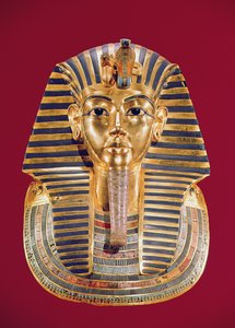 القناع الجنائزي لتوت عنخ آمون (1370-1352 قبل الميلاد) 1336-1327 قبل الميلاد ، المملكة الحديثة (الذهب المطعم بالأحجار شبه الكريمة)