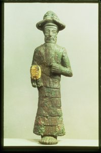 إله عيلامي بيد ذهبية من سوزا ، جنوب غرب إيران ، حوالي 1800-1700 قبل الميلاد (برونزي وذهبي)