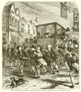 تم جذب جون ويلكس إلى المدينة من قبل الغوغاء ، عندما كان في طريقه إلى السجن ، 1768 بواسطة مدرسة اللغة الإنجليزية