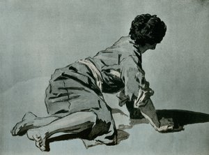 دراسة صبي جالس على الأرض