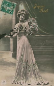 عيد ميلاد سعيد. أُرسلت البطاقة البريدية عام 1913. بواسطة مصور فرنسي