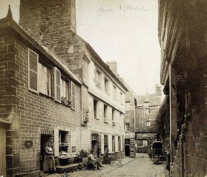 The hotel and the Poulard Inn at the entrance of Mont-Saint-Michel, late 19th century بواسطة مصور فرنسي