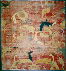 جزء من سجادة بحيوانات رائعة على أرضية حمراء ، موغال ، c.158085 (كومة من القطن والصوف) بواسطة المدرسة الهندية