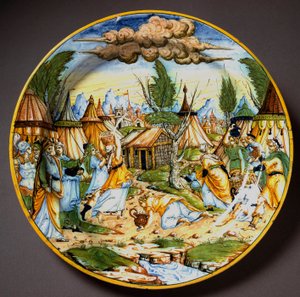 اليهود في الصحراء (أو استرجاع المن). يغذي الله الإسرائيليين الذين يتضورون جوعاً من بيض السمان والمَن (المن). صفيحة خزفية منتجة في أوربينو في ورشة فونتانا بإيطاليا. 1560 حول فلورنسا ، متحف ناسيونالي ديل بارجيلو بواسطة المدرسة الايطالية