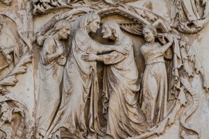 Mary visiting Elizabeth, detail from Scenes from life of Christ, Stories from New Testament, bas-reliefs by Lorenzo Maitani (before 1275-1330), third pillar, facade of Orvieto cathedral, Umbria, Italy