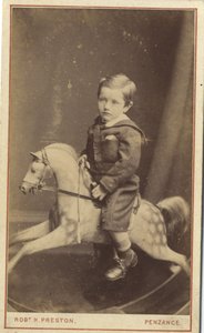 صبي صغير يجلس على حصان هزاز ، 1870 (طبعة زخرفية) بواسطة روبرت هـ. بريستون