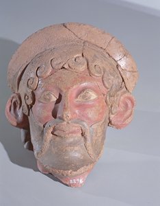 رأس زيوس (الطين) بواسطة رواية