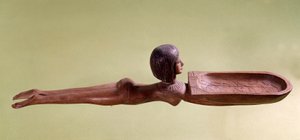 الأنتيكيت المصري: ملعقة خشبية لملعقة مستحضرات التجميل تسمى سباح عارٍ يحمل بطة. الأسرة الثامنة عشر ، الإمبراطورية الجديدة. باريس ، متحف اللوفر بواسطة المدرسة المصرية